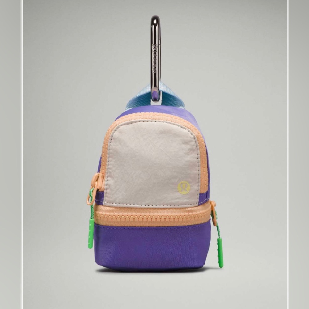 Lululemon City Adventurer Backpack Nano
White Opal/Lavender/Summer Glow/Blue